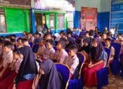 Edukasi Sejak Dini, Tim Dosen Mikrobiologi FK UPR Sosialisasikan Bahaya Narkoba dan Kesehatan Reproduksi di Desa Kanamit